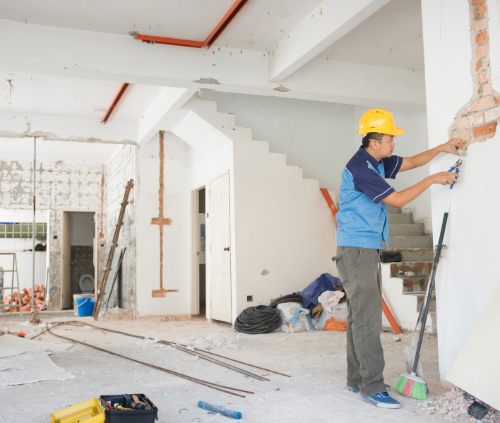 Construction worker renovating building